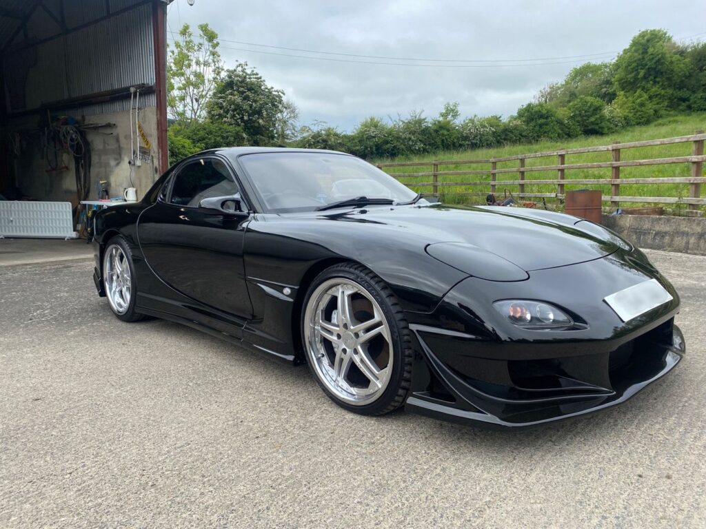 A beautifully kept Mazda Rx7, in for Head unit and DAB antenna installation, front speaker installation